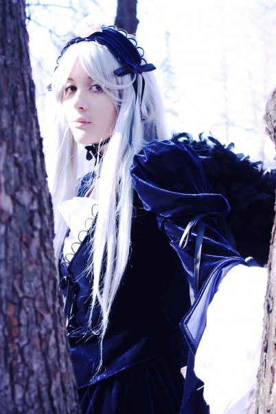 1girl bangs blurry blurry_background closed_mouth depth_of_field dress frills hairband lolita_fashion long_hair long_sleeves ribbon silver_hair solo suigintou very_long_hair white_hair