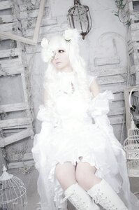 Rating: Safe Score: 0 Tags: 1girl auto_tagged bicycle birdcage boots cage dress flower kirakishou lace long_hair sitting solo white_dress white_hair User: admin