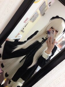 Rating: Safe Score: 0 Tags: 1girl bangs black_dress blonde_hair dress indoors long_hair long_sleeves mirror photo solo standing suigintou User: admin
