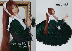 Rating: Safe Score: 0 Tags: 1girl brown_hair character_name dress frills gothic_lolita green_dress lolita_fashion long_hair long_sleeves solo suiseiseki very_long_hair User: admin