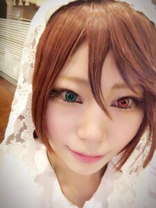 Rating: Safe Score: 0 Tags: 1girl bangs brown_hair closed_mouth eyelashes face green_eyes hair_between_eyes lips looking_at_viewer portrait short_hair smile solo suiseiseki User: admin