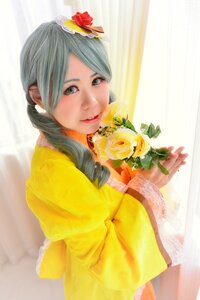 Rating: Safe Score: 0 Tags: 1girl curtains flower hair_flower hair_ornament hair_over_shoulder kanaria lips long_hair looking_at_viewer makeup red_flower rose solo yellow_dress User: admin