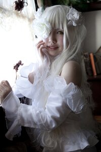 Rating: Safe Score: 0 Tags: 1girl bug butterfly flower gloves hair_flower hair_ornament insect kirakishou lips long_hair smile solo User: admin