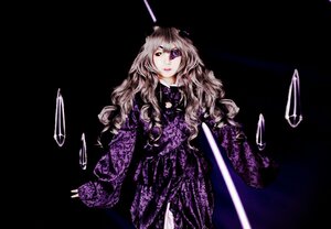 Rating: Safe Score: 0 Tags: 1girl barasuishou black_background dress long_hair long_sleeves looking_at_viewer purple_eyes solo wavy_hair User: admin