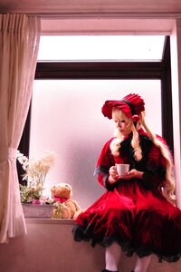 Rating: Safe Score: 0 Tags: 1girl blonde_hair bow curtains dress flower indoors long_hair long_sleeves red_dress shinku solo window User: admin