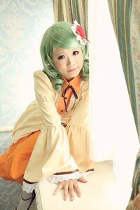 Rating: Safe Score: 0 Tags: 1girl flower green_eyes green_hair hair_flower hair_ornament kanaria kochiya_sanae lips photo smile snake solo User: admin