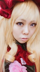 Rating: Safe Score: 0 Tags: 1girl bangs blonde_hair blue_eyes bow closed_mouth eyelashes hair_bow lips long_hair looking_at_viewer nose portrait realistic red_bow shinku simple_background solo User: admin