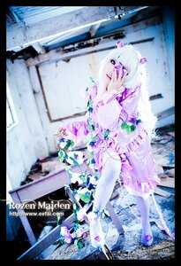 Rating: Safe Score: 0 Tags: 1girl barasuishou black_border blurry border depth_of_field dress frilled_dress frills hair_ornament letterboxed pillarboxed purple_eyes solo thighhighs white_hair User: admin