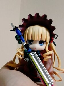 Rating: Safe Score: 0 Tags: 1girl bangs blonde_hair blue_eyes bonnet dress gun long_hair long_sleeves shinku simple_background solo weapon User: admin