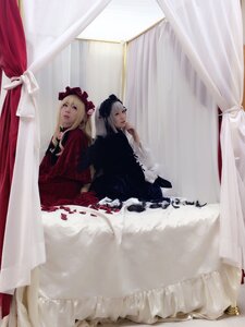 Rating: Safe Score: 0 Tags: 2girls blonde_hair blue_eyes curtain_grab curtains dress indoors long_hair long_sleeves multiple_cosplay multiple_girls shinku sitting tagme window User: admin