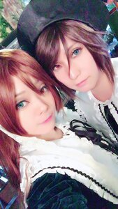 Rating: Safe Score: 0 Tags: 2girls bangs blue_eyes brown_hair closed_mouth green_eyes hair_between_eyes hat heterochromia lips long_hair looking_at_viewer multiple_cosplay multiple_girls red_eyes siblings sisters smile souseiseki tagme twins User: admin