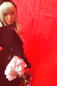 Rating: Safe Score: 0 Tags: 1girl dress flower frills hairband lips looking_at_viewer red_background red_theme solo suigintou User: admin