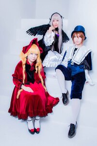Rating: Safe Score: 0 Tags: 1boy 2girls black_wings blonde_hair blue_eyes bonnet dress feathers hat long_hair multiple_cosplay multiple_girls pantyhose red_dress ribbon shinku silver_hair sitting tagme wings User: admin