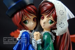 Rating: Safe Score: 0 Tags: 2girls auto_tagged blurry depth_of_field doll frills green_eyes hat heterochromia holding_hands interlocked_fingers long_sleeves looking_at_viewer multiple_dolls multiple_girls red_eyes short_hair siblings sisters souseiseki suiseiseki tagme top_hat twins User: admin