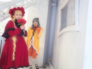 Rating: Safe Score: 0 Tags: 2girls blonde_hair blue_hair bow closed_eyes curtains dress flower frills hair_ornament indoors long_sleeves multiple_girls red_dress siblings standing window User: admin