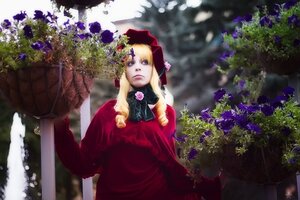 Rating: Safe Score: 0 Tags: 1girl blonde_hair blue_eyes bonnet dress flower long_sleeves outdoors plant red_dress shinku solo User: admin