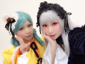 Rating: Safe Score: 0 Tags: 2girls closed_mouth flower green_eyes hair_flower hair_ornament hand_on_own_cheek lace lips long_hair looking_at_viewer multiple_cosplay multiple_girls realistic red_eyes rose smile suigintou tagme User: admin