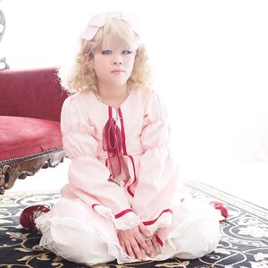 Rating: Safe Score: 0 Tags: 1girl blonde_hair blue_eyes dress hinaichigo lips puffy_sleeves realistic ribbon shoes short_hair sitting solo striped vertical_stripes User: admin