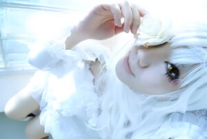Rating: Safe Score: 0 Tags: 1girl animal_ears blurry closed_mouth depth_of_field holding kirakishou looking_at_viewer monster_girl smile solo white_hair yellow_eyes User: admin