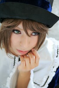 Rating: Safe Score: 0 Tags: 1girl bangs black_headwear blonde_hair blue_eyes blurry blurry_background blurry_foreground closed_mouth depth_of_field hair_between_eyes hat lips looking_at_viewer nose photo realistic short_hair smile solo souseiseki User: admin