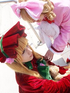Rating: Safe Score: 0 Tags: 1girl blonde_hair bonnet book bow flower hina_ichigo long_hair long_sleeves multiple_cosplay pink_bow realistic rose shinku tagme User: admin