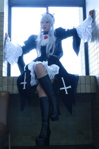 Rating: Safe Score: 0 Tags: 1girl blue_eyes boots dress frills indoors long_hair long_sleeves maid solo suigintou thighhighs window User: admin