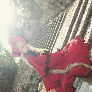 Rating: Safe Score: 0 Tags: 1girl blonde_hair bonnet bow building dress frills hair_bow long_hair red_dress shinku solo User: admin