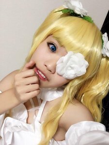 Rating: Safe Score: 0 Tags: 1girl auto_tagged bare_shoulders blonde_hair blue_eyes choker dress flower hair_ornament kirakishou lips long_hair solo User: admin