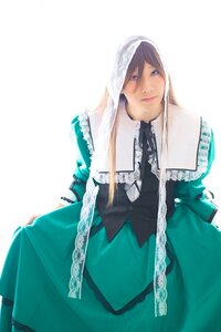 Rating: Safe Score: 0 Tags: 1girl bangs blue_eyes brown_hair dress frills green_dress lips long_sleeves looking_at_viewer simple_background smile solo suiseiseki veil white_background User: admin