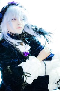Rating: Safe Score: 0 Tags: 1girl bangs black_dress closed_mouth dress feathers flower frills gothic_lolita hairband lolita_hairband long_hair long_sleeves looking_at_viewer purple_eyes ribbon rose silver_hair solo suigintou white_background User: admin