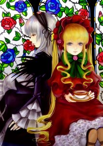 Rating: Safe Score: 0 Tags: 2girls blonde_hair blue_eyes blue_flower blue_rose bonnet bow cup dress flower frills image long_hair multiple_girls pair red_dress red_flower red_rose rose shinku sitting suigintou teacup thorns User: admin