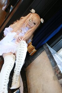 Rating: Safe Score: 0 Tags: 1girl auto_tagged blonde_hair boots dress flower hair_flower hair_ornament instrument kirakishou long_hair photo sitting solo thighhighs white_legwear User: admin