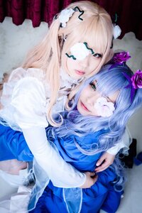 Rating: Safe Score: 0 Tags: 2girls 91076 bangs blonde_hair blue_dress blue_hair bow dress eyepatch flower frills hair_flower hair_ornament lips long_hair long_sleeves looking_at_viewer multiple_cosplay multiple_girls smile tagme User: admin