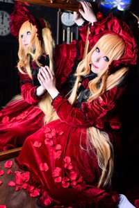 Rating: Safe Score: 0 Tags: 1girl 2girls blonde_hair blue_eyes blurry bonnet bow curtains depth_of_field dress flower indoors long_hair multiple_girls red_dress rose shinku sitting solo User: admin