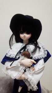 Rating: Safe Score: 0 Tags: 2girls bangs black_hair blue_eyes brown_hair doll dress frills hair_over_one_eye hat long_hair long_sleeves multiple_girls solo souseiseki white_dress User: admin