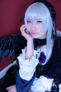 Rating: Safe Score: 0 Tags: 1girl bangs black_dress blurry blurry_background closed_mouth depth_of_field dress frills gothic_lolita hairband lips lolita_fashion lolita_hairband long_hair long_sleeves looking_at_viewer purple_eyes sitting solo suigintou upper_body User: admin