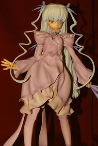 Rating: Safe Score: 0 Tags: 1girl barasuishou doll dress frills long_hair long_sleeves ribbon silver_hair solo standing very_long_hair white_hair yellow_eyes User: admin