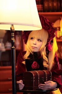 Rating: Safe Score: 0 Tags: 1girl blonde_hair blurry blurry_background bonnet depth_of_field dress flower lips long_hair long_sleeves rose shinku solo upper_body User: admin