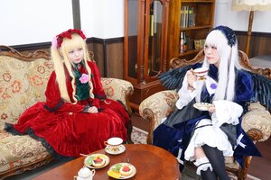 Rating: Safe Score: 0 Tags: 2girls blonde_hair blue_eyes bonnet cup dress flower food gothic_lolita lolita_fashion long_hair multiple_cosplay multiple_girls pastry shinku sitting table tagme tea teacup User: admin
