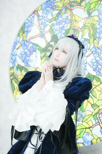 Rating: Safe Score: 0 Tags: 1girl dress flower frills hairband long_hair long_sleeves red_eyes solo suigintou white_hair User: admin