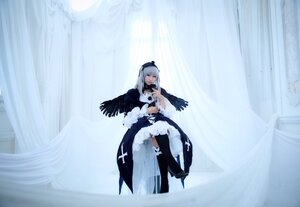 Rating: Safe Score: 0 Tags: 1girl black_wings closed_eyes dress feathered_wings feathers hairband long_hair long_sleeves silver_hair solo standing suigintou thighhighs wings User: admin