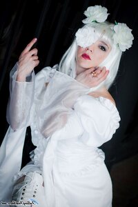 Rating: Safe Score: 0 Tags: 1girl artist_name flower jewelry kirakishou lips long_sleeves looking_at_viewer nail_polish red_lips solo sweater white_flower white_hair white_sweater wings User: admin