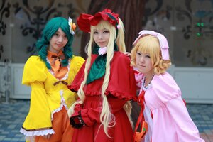 Rating: Safe Score: 0 Tags: 3girls blonde_hair blue_eyes blurry depth_of_field dress drill_hair flower frills hat lips long_hair multiple_cosplay multiple_girls photo realistic smile tagme User: admin