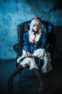 Rating: Safe Score: 0 Tags: 1girl black_legwear choker dress flower frills gothic_lolita lolita_fashion realistic sitting solo suigintou water User: admin
