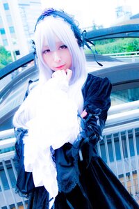 Rating: Safe Score: 0 Tags: 1girl 3d feathers hairband lips long_hair long_sleeves looking_at_viewer purple_eyes smile solo suigintou User: admin