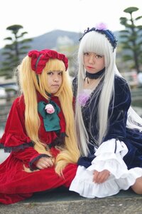 Rating: Safe Score: 0 Tags: 2girls 91076 bangs blonde_hair blurry blurry_background blurry_foreground bonnet depth_of_field dress lips long_hair long_sleeves multiple_cosplay multiple_girls photo red_dress shinku sitting tagme User: admin
