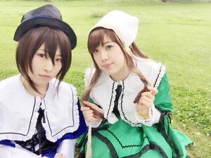 Rating: Safe Score: 0 Tags: 2girls brown_hair dress green_background green_dress green_eyes hat head_scarf heterochromia lips long_hair looking_at_viewer multiple_cosplay multiple_girls red_eyes siblings sisters souseiseki suiseiseki tagme twins User: admin