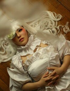Rating: Safe Score: 0 Tags: 1girl blue_eyes breasts corset dress frills kirakishou large_breasts lips long_hair looking_at_viewer nail_polish on_back parted_lips solo white_hair User: admin
