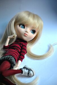 Rating: Safe Score: 0 Tags: 1girl bicycle blonde_hair blue_eyes doll long_hair shinku shoes solo striped traditional_media User: admin
