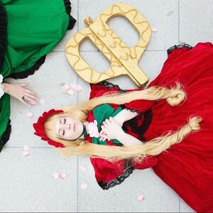 Rating: Safe Score: 0 Tags: blonde_hair bonnet closed_eyes dress green_dress long_hair petals red_dress shinku solo User: admin